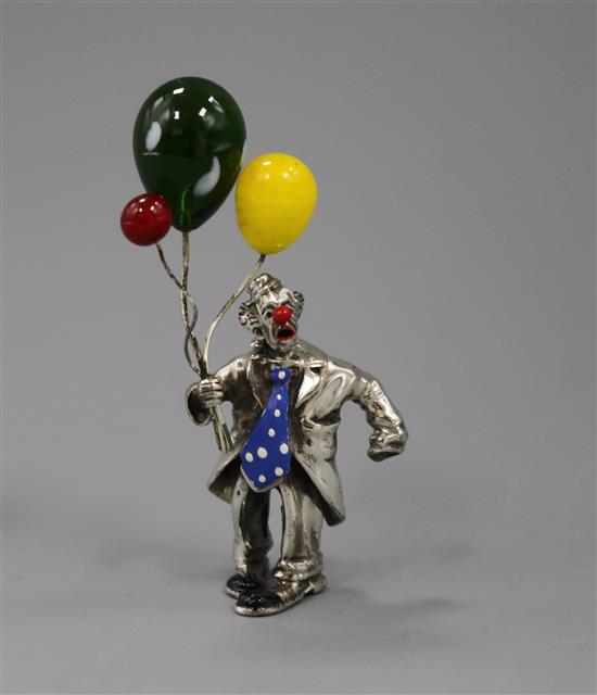 A white metal, enamel and glass set figure of a clown with balloons, 86mm.